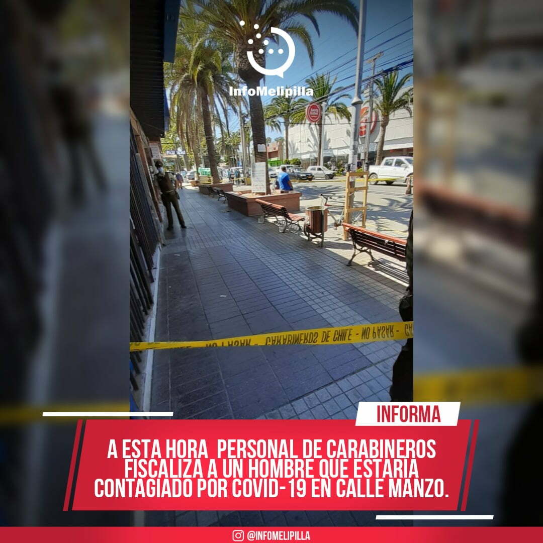 Personal de carabineros fiscaliza a un hombre que estaría contagiado por Covid-19 en la calle manzo